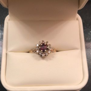 14k gold ring ruby center and genuine diamonds